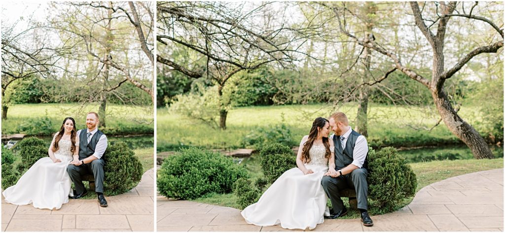 Josh and Prisca sitting on a stone bench during their Arkansas Elopement