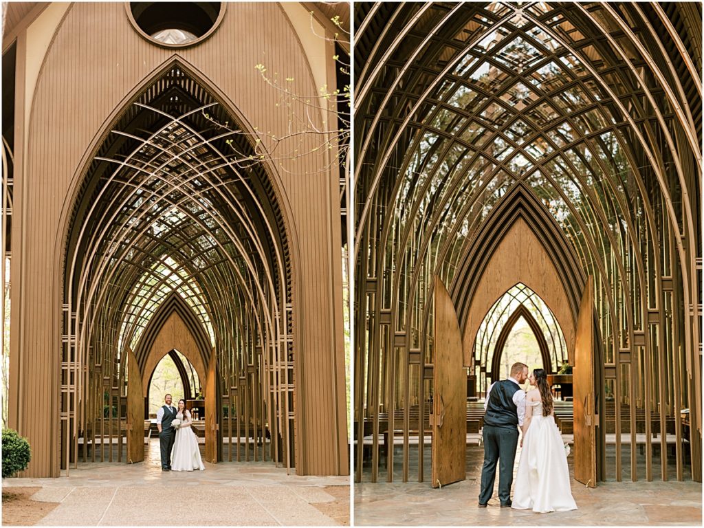 Josh and Prisca posing and kissing outside the doors of the cathedral during their Arkansas Elopement