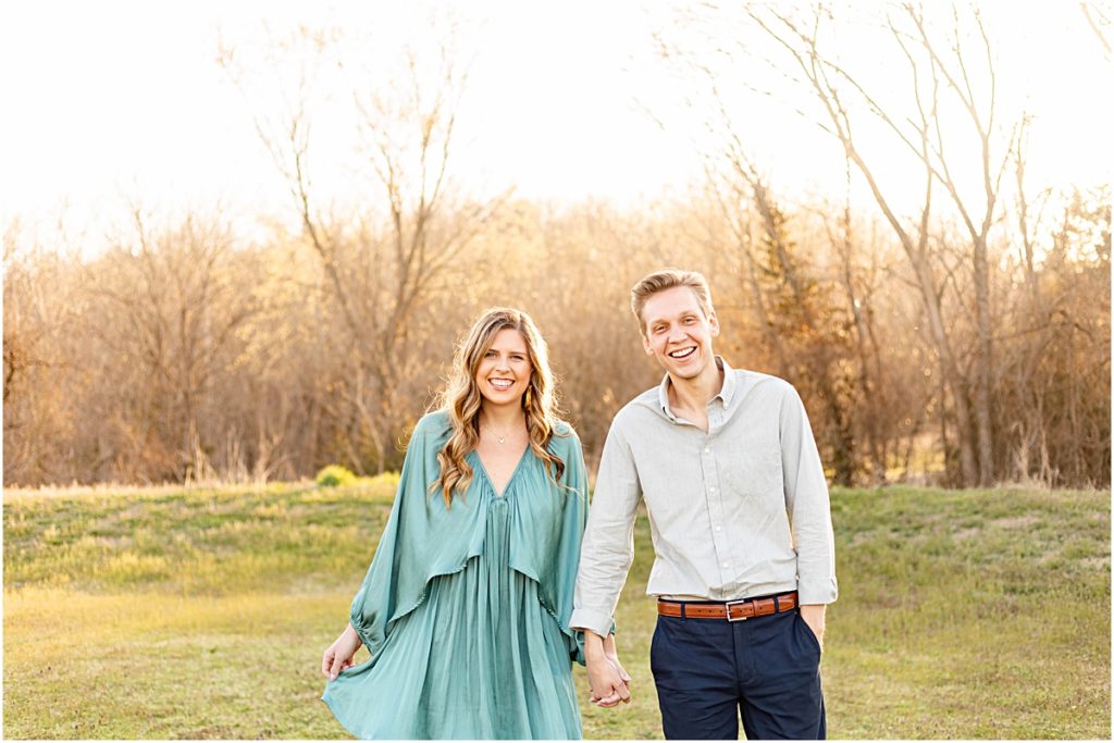 Jillian and Craig posing in a field during Bella Vista Engagement