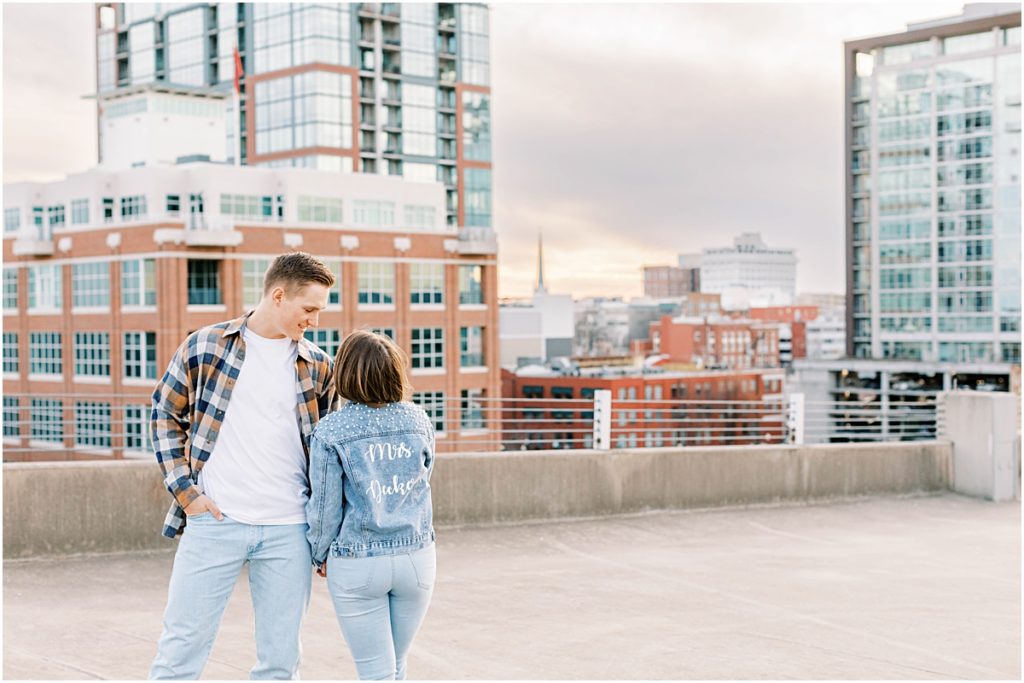 Madi and Ty on parking garage rooftop. 