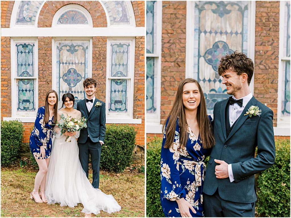 Lawrence and Emily with family outside church, stained glass windows and bushes in background