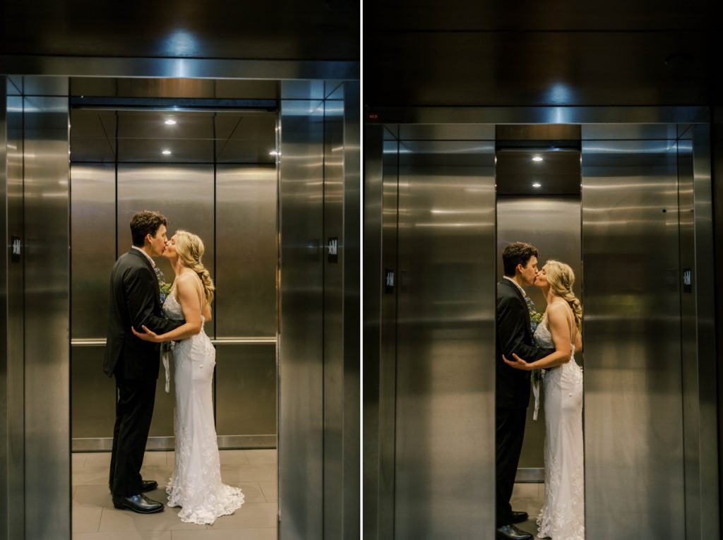 The bride and groom kissing in the elevator on the way to their reception  at the University of Arkansas stadium