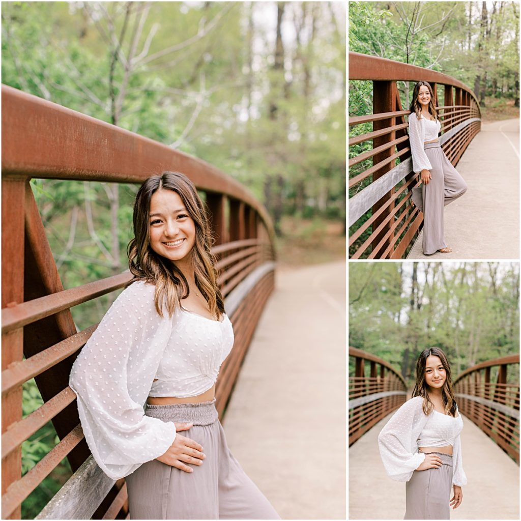 Collage of Kaiyah leaning against the railing of a bridge in grey wide legged pants and a white top during her senior session.